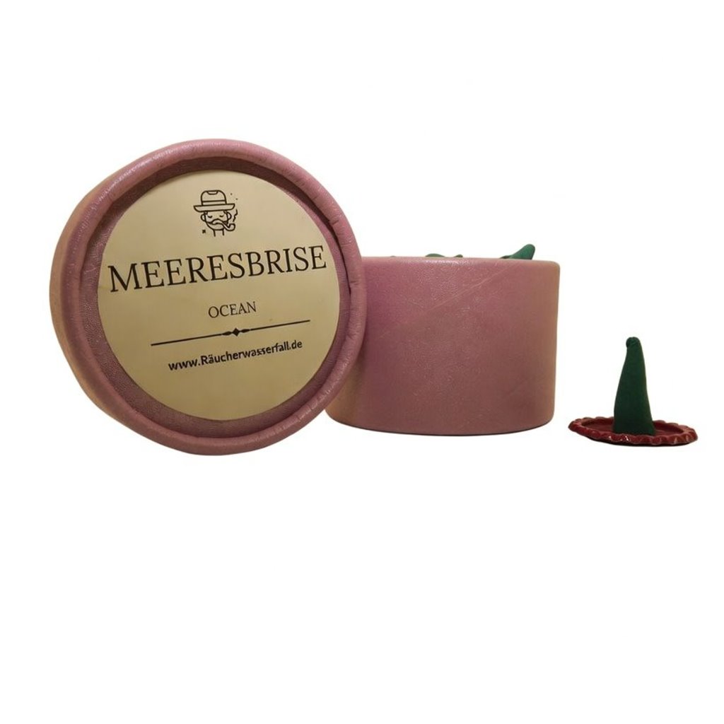 Packung mit klassischen Räucherkerzen in der Duftvariante "Meeresbrise" mit einzelner Kerze auf Metallunterlage daneben