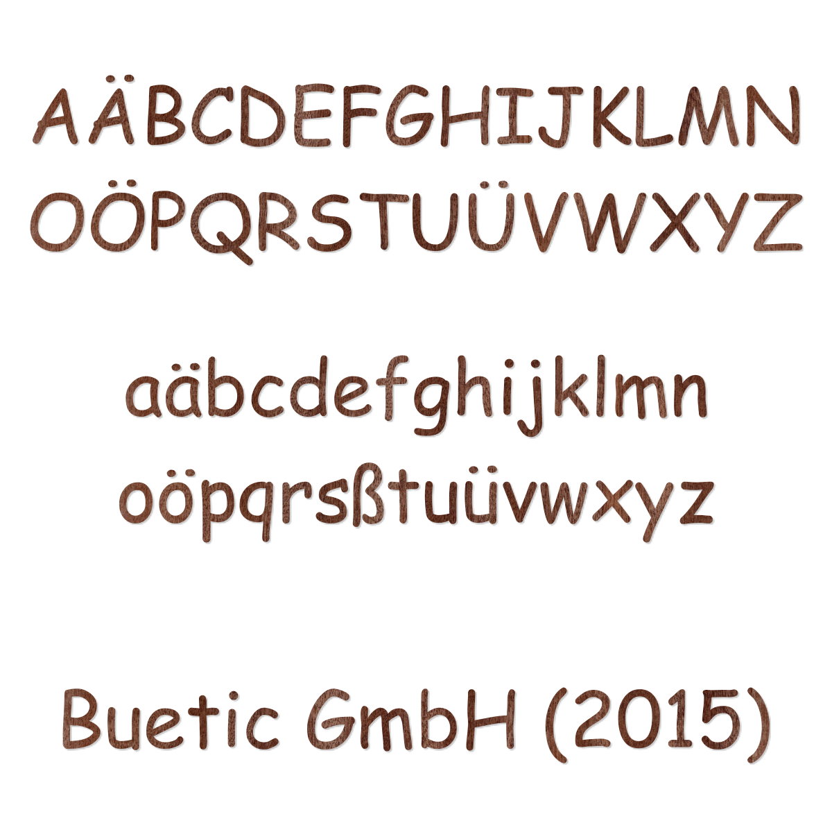 Buchstaben Comic Sans MS aus dunklem Furnier