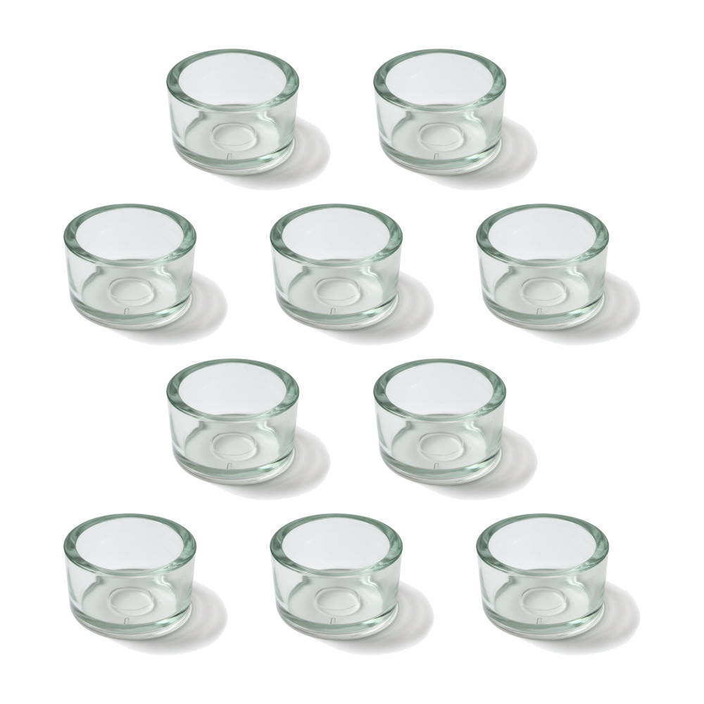 Zehn klare, flache Teelichtgläser aus transparentem Glas mit einem Durchmesser von 40 mm, auf weißem Hintergrund angeordnet.